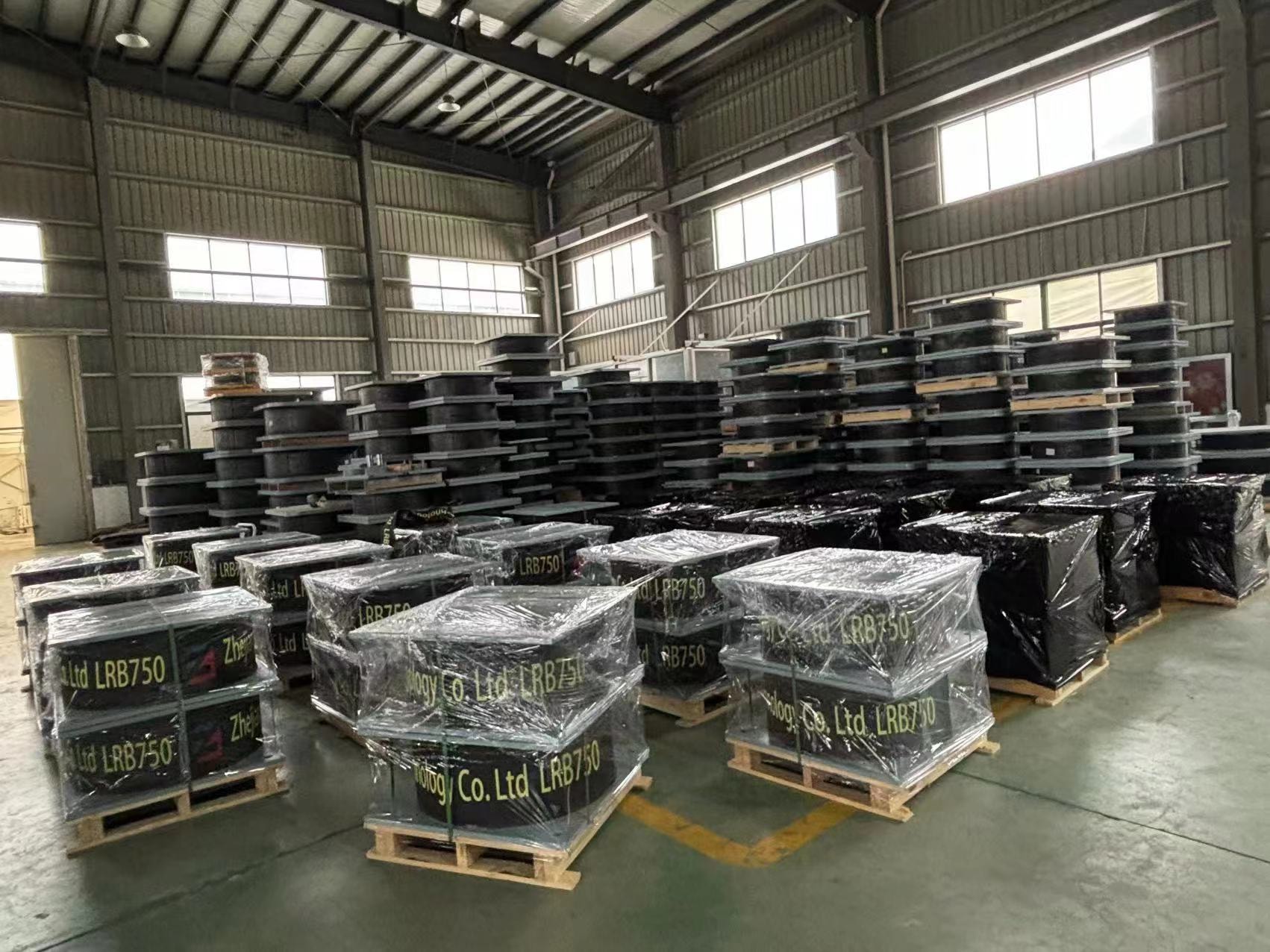 Warehouse inventory of seismic isolation components ready for project supply